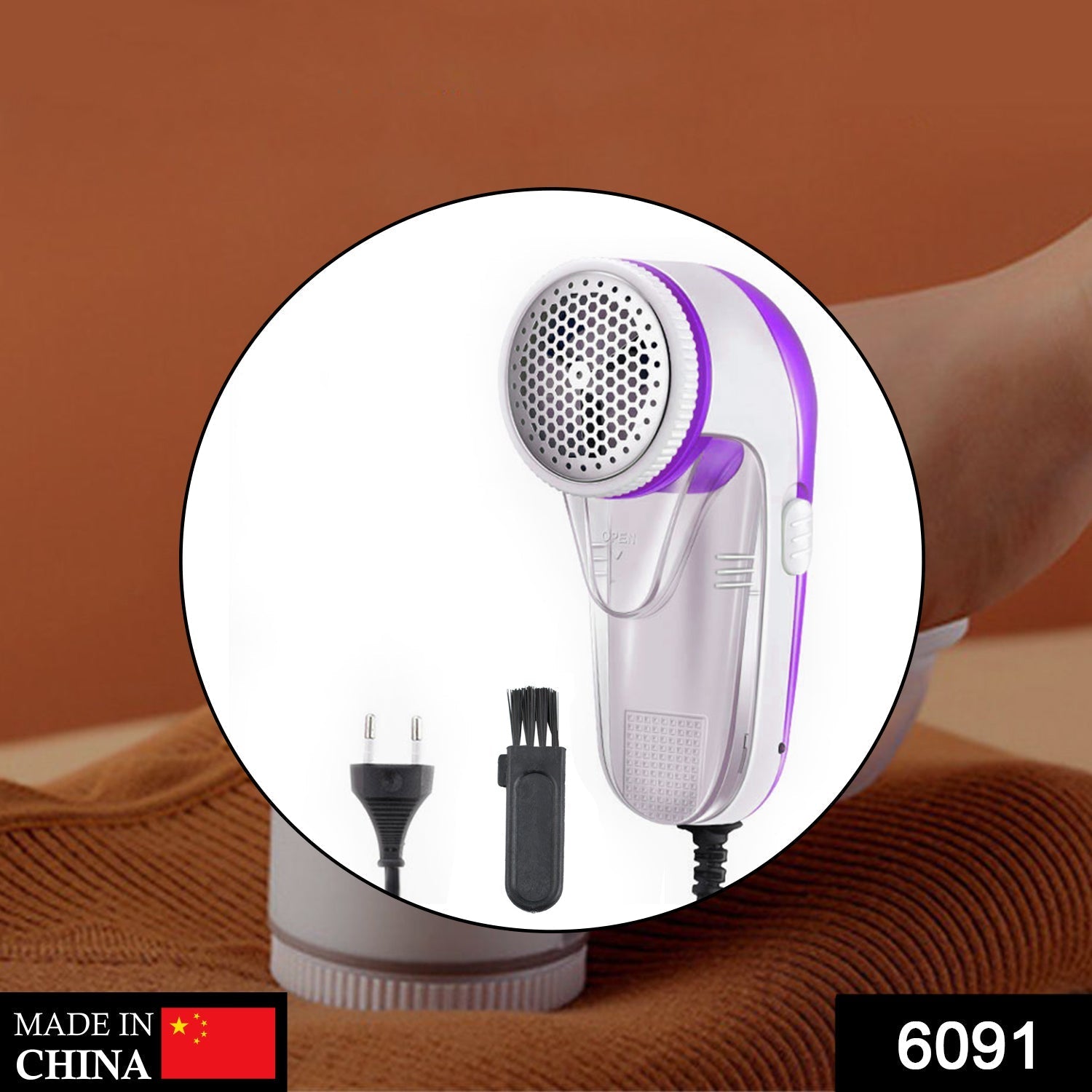 the lint remover, emphasizing its blade and ergonomic handle the lint remover, emphasizing its blade and ergonomic handle